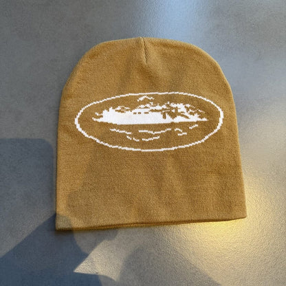 Oval Distressed Graphic Knit Beanie Camel / White